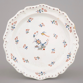 A large Brussels faience dish, decor "A la haie fleurie", 18th C.